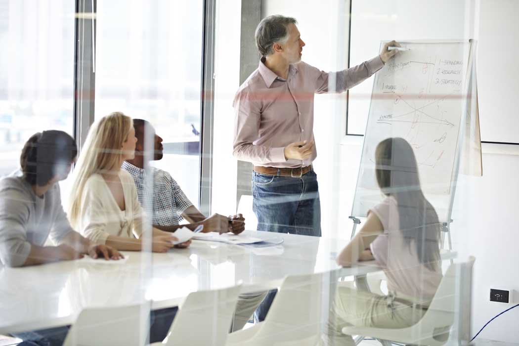 Shot of a group of business colleagues in a boardroom meeting